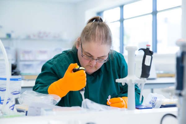 female scientist working in lab
